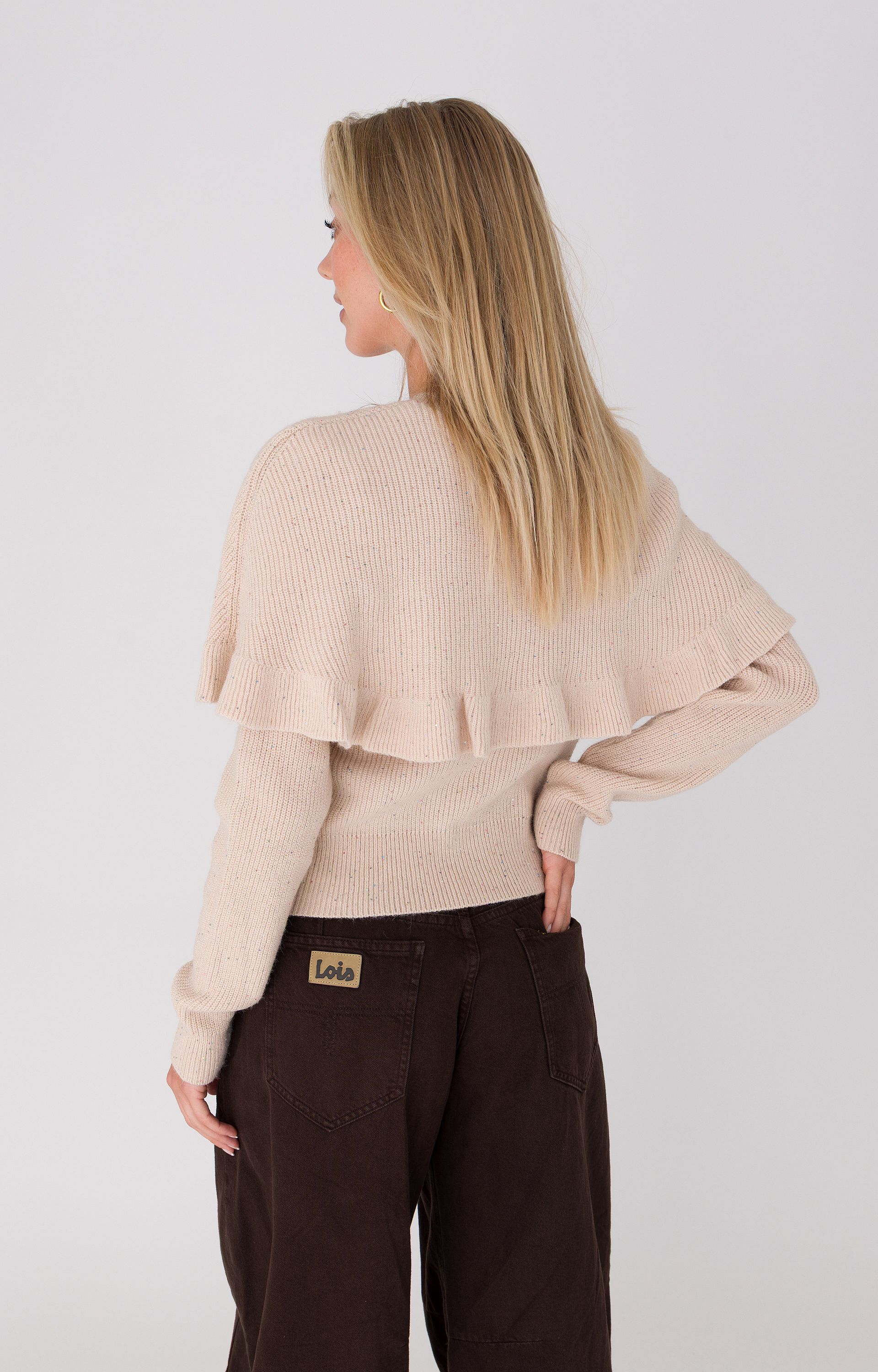 Vest met ruffle cape 