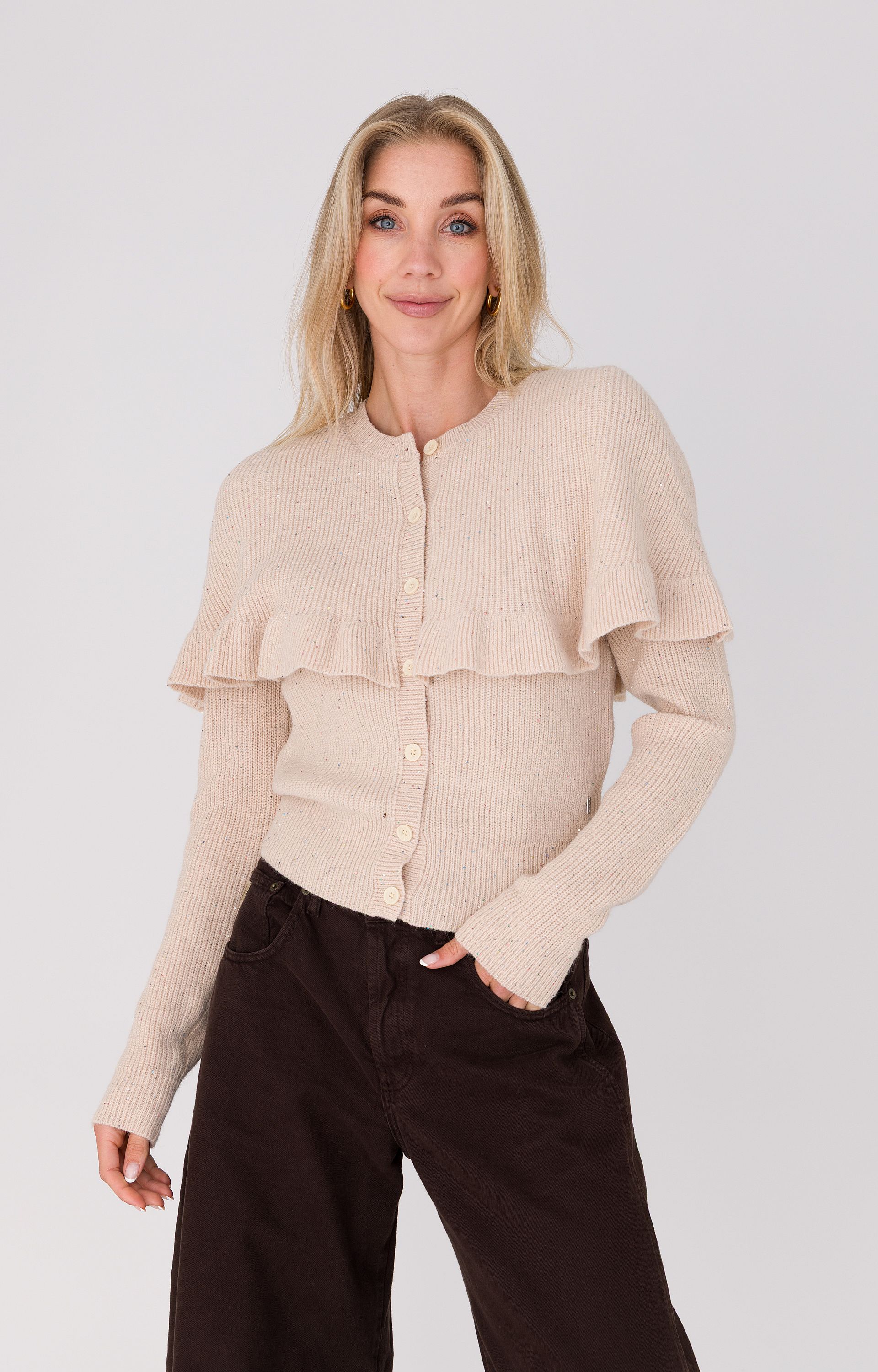 Vest met ruffle cape 