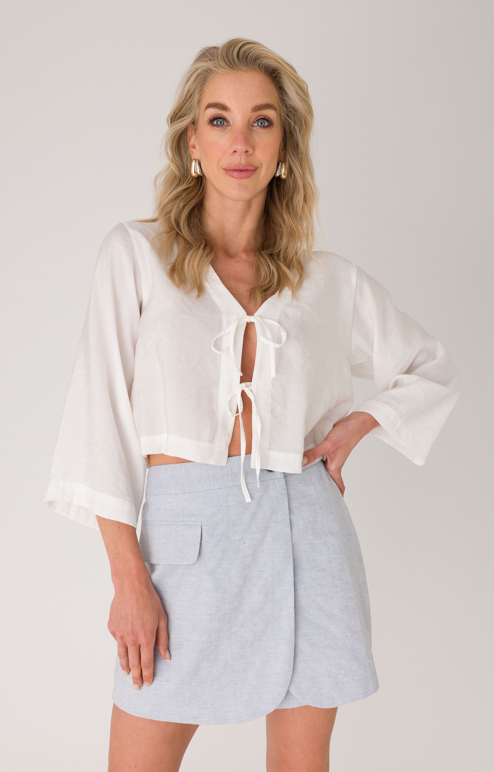 Blouse met strikjes